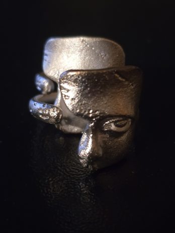 The Enigmatic Visage Ring